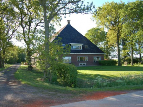 Отель Rural holiday home in the Frisian Workum with a lovely sunny terrace  Волкум